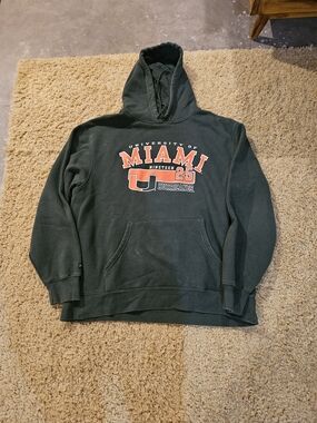 Jansport Dark Green Miami Graphic Hooded Sweatshirt with Orange Accents